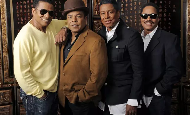 FILE - From left, brothers Jackie Jackson, Tito Jackson, Jermaine Jackson and Marlon Jackson pose for a portrait together in Beverly Hills, Calif., Dec. 9, 2009. (AP Photo/Chris Pizzello, File)