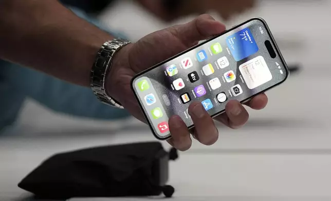 FILE - The iPhone 15 Pro is shown after its introduction on the Apple campus, Sept. 12, 2023, in Cupertino, Calif. (AP Photo/Jeff Chiu, File)