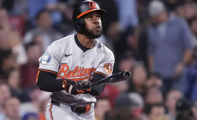 Baltimore Orioles' Cedric Mullins watches the fight of his two-run home run during the third inning of a baseball game against the Boston Red Sox at Fenway Park, Tuesday, Sept. 10, 2024, in Boston. (AP Photo/Charles Krupa)