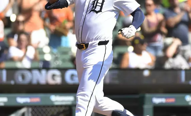 Detroit Tigers' Riley Greene reacts after hitting a two-run home run off Baltimore Orioles starting pitcher Cade Povich in the third inning of a baseball game, Sunday, Sept. 15, 2024, in Detroit. (AP Photo/Jose Juarez)