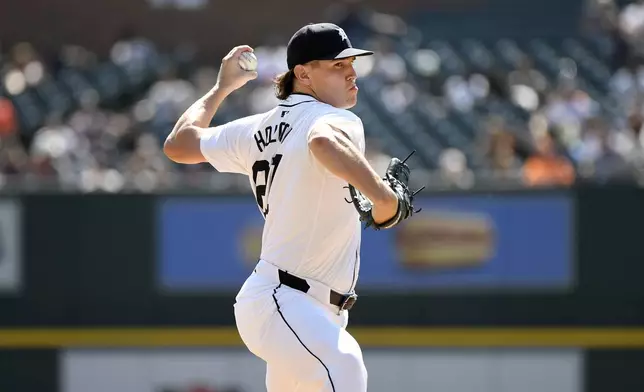 Detroit Tigers pitcher Tyler Holton throws against the Baltimore Orioles in the sixth inning of a baseball game, Sunday, Sept. 15, 2024, in Detroit. (AP Photo/Jose Juarez)