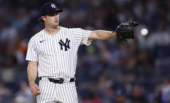 New York Yankees' Gerrit Cole takes the ball during the first inning of a baseball game against the Baltimore Orioles, Thursday, Sept. 26, 2024, in New York. (AP Photo/Noah K. Murray)