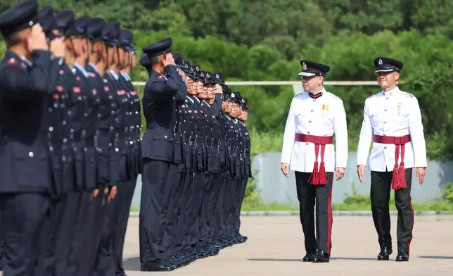 Deputy Director of Fire Services (Operations) reviews Fire Services passing-out parade  Source: HKSAR Government Press Releases