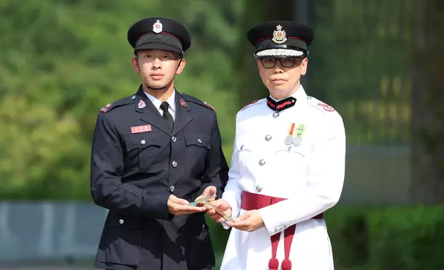 Deputy Director of Fire Services (Operations) reviews Fire Services passing-out parade  Source: HKSAR Government Press Releases