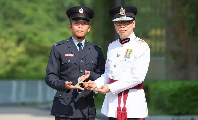 Deputy Director of Fire Services (Operations) reviews Fire Services passing-out parade  Source: HKSAR Government Press Releases