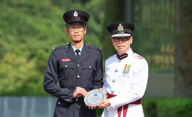 Deputy Director of Fire Services (Operations) reviews Fire Services passing-out parade  Source: HKSAR Government Press Releases