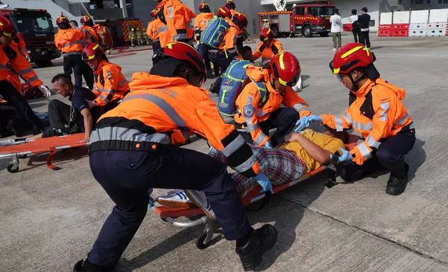 Deputy Director of Fire Services (Operations) reviews Fire Services passing-out parade  Source: HKSAR Government Press Releases