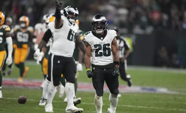 Philadelphia Eagles running back Saquon Barkley (26) reacts during the second half of an NFL football game against the Green Bay Packers, Friday, Sept. 6, 2024, at the Neo Quimica Arena in Sao Paulo. (AP Photo/Fernando Llano)