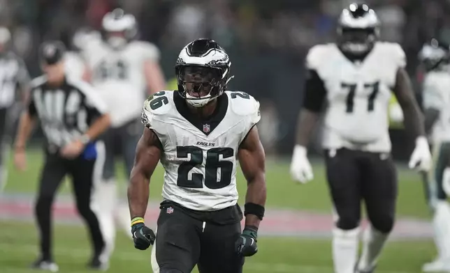 Philadelphia Eagles running back Saquon Barkley (26) reacts during the second half of an NFL football game against the Green Bay Packers, Friday, Sept. 6, 2024, at the Neo Quimica Arena in Sao Paulo. (AP Photo/Fernando Llano)