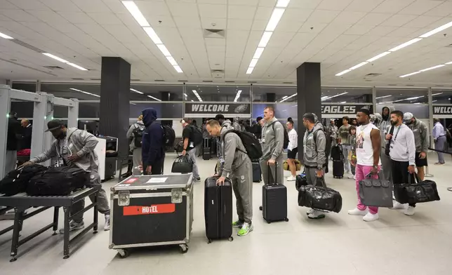 The Philadelphia Eagles arrive for an NFL football against the Green Bay Packers, Friday, Sept. 6, 2024, at the Neo Quimica Arena in Sao Paulo. (AP Photo/Andre Penner)