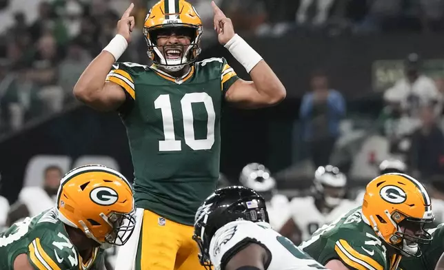 Green Bay Packers quarterback Jordan Love (10) plays against the Philadelphia Eagles during the first half of an NFL football game, Friday, Sept. 6, 2024, at the Neo Quimica Arena in Sao Paulo. (AP Photo/Doug Benc)