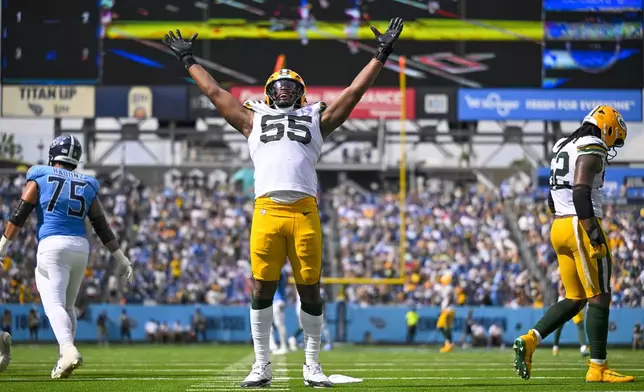 Green Bay Packers' Kingsley Enagbare celebrates a sack during the second half of an NFL football game against the Tennessee Titans Sunday, Sept. 22, 2024, in Nashville, Tenn. (AP Photo/John Amis)