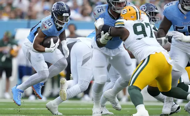 Tennessee Titans' Tony Pollard runs during the first half of an NFL football game against the Green Bay Packers Sunday, Sept. 22, 2024, in Nashville, Tenn. (AP Photo/George Walker IV)