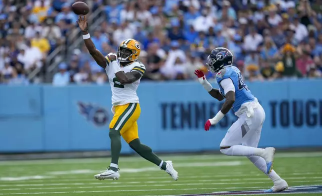 Green Bay Packers' Malik Willis throws during the first half of an NFL football game against the Tennessee Titans Sunday, Sept. 22, 2024, in Nashville, Tenn. (AP Photo/George Walker IV)