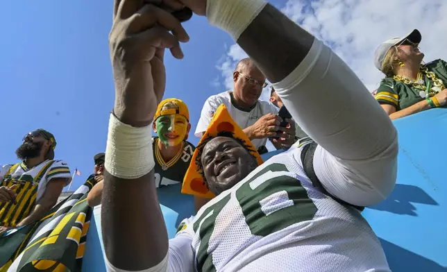 Green Bay Packers' Kadeem Telfort takes a selfie after an NFL football game against the Tennessee Titans Sunday, Sept. 22, 2024, in Nashville, Tenn. (AP Photo/John Amis)