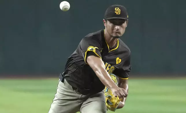 San Diego Padres pitcher Yu Darvish throws against the Arizona Diamondbacks in the first inning during a baseball game, Friday, Sept. 27, 2024, in Phoenix. (AP Photo/Rick Scuteri)