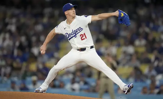 Los Angeles Dodgers starting pitcher Walker Buehler works against a San Diego Padres batter during the first inning of a baseball game Thursday, Sept. 26, 2024, in Los Angeles. (AP Photo/Ashley Landis)