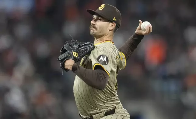 San Diego Padres pitcher Dylan Cease works against the San Francisco Giants during the first inning of a baseball game in San Francisco, Friday, Sept. 13, 2024. (AP Photo/Jeff Chiu)