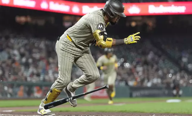 San Diego Padres' Luis Arraez runs to first base on his RBI single during the sixth inning of a baseball game against the San Francisco Giants in San Francisco, Saturday, Sept. 14, 2024. (AP Photo/Jeff Chiu)