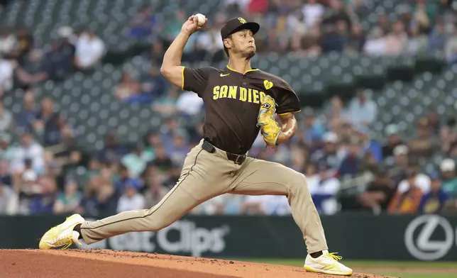 San Diego Padres starting pitcher Yu Darvish throws during the first inning of a baseball game against the Seattle Mariners, Tuesday, Sept. 10, 2024, in Seattle. (AP Photo/Jason Redmond)