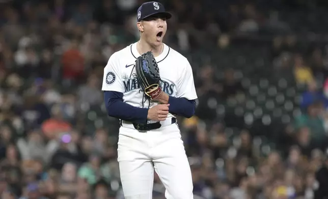 Seattle Mariners starting pitcher Bryan Woo reacts after missing a strike call on San Diego Padres' Jake Cronenworth during the seventh inning of a baseball game against the San Diego Padres, Wednesday, Sept. 11, 2024, in Seattle. (AP Photo/Jason Redmond)