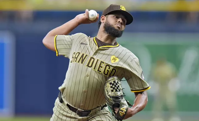 San Diego Padres starting pitcher Randy Vasquez delivers to the Tampa Bay Rays during the first inning of a baseball game Saturday, Aug. 31, 2024, in St. Petersburg, Fla. (AP Photo/Chris O'Meara)