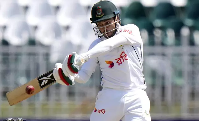 Bangladesh's Mehidy Hasan Mirza plays a shot during the third day of second test cricket match between Pakistan and Bangladesh, in Rawalpindi, Pakistan, Sunday, Sept. 1, 2024. (AP Photo/Anjum Naveed)