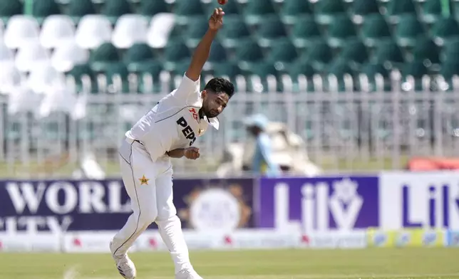 Pakistan's Khurram Shahzad bowls during the third day of second test cricket match between Pakistan and Bangladesh, in Rawalpindi, Pakistan, Sunday, Sept. 1, 2024. (AP Photo/Anjum Naveed)