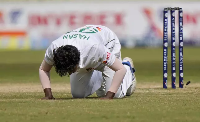 Bangladesh's Hasan Mahmud performs Sajdah, a prayer bow in gratitude to God, after taking his fifth wicket, during the fourth day of second test cricket match between Pakistan and Bangladesh, in Rawalpindi, Pakistan, Monday, Sept. 2, 2024. (AP Photo/Anjum Naveed)