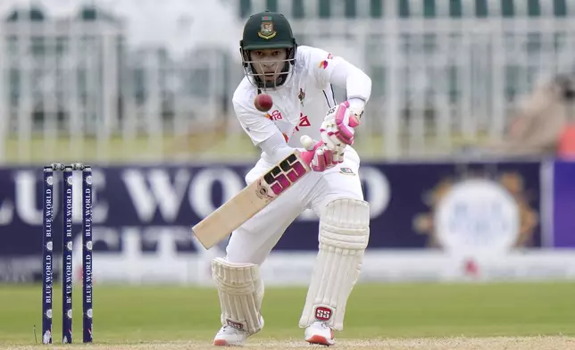 Bangladesh's Mushfiqur Rahim plays a shot during the fifth day of second test cricket match between Pakistan and Bangladesh, in Rawalpindi, Pakistan, Tuesday, Sept. 3, 2024. (AP Photo/Anjum Naveed)