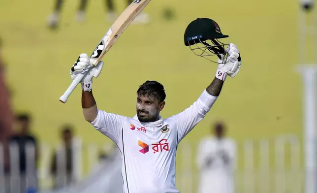 Bangladesh's Litton Das celebrates after scoring century during the third day of second test cricket match between Pakistan and Bangladesh, in Rawalpindi, Pakistan, Sunday, Sept. 1, 2024. (AP Photo/Anjum Naveed)