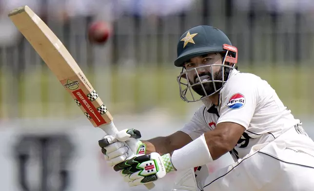 Pakistan's Mohammad Rizwan plays a shot during the fourth day of second test cricket match between Pakistan and Bangladesh, in Rawalpindi, Pakistan, Monday, Sept. 2, 2024. (AP Photo/Anjum Naveed)