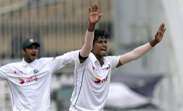 Bangladesh's Hasan Mahmud, second right, and teammates appeal for dismissal of Pakistan's Mir Hamza during the fourth day of second test cricket match between Pakistan and Bangladesh, in Rawalpindi, Pakistan, Monday, Sept. 2, 2024. (AP Photo/Anjum Naveed)