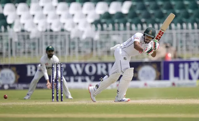 Bangladesh's Najmul Hossain Shanto plays a shot during the fifth day of second test cricket match between Pakistan and Bangladesh, in Rawalpindi, Pakistan, Tuesday, Sept. 3, 2024. (AP Photo/Anjum Naveed)