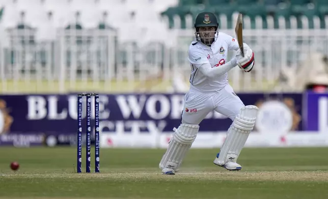 Bangladesh's Mehidy Hasan Mirza plays a shot during the third day of second test cricket match between Pakistan and Bangladesh, in Rawalpindi, Pakistan, Sunday, Sept. 1, 2024. (AP Photo/Anjum Naveed)