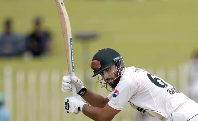 Pakistan's Salman Ali Agha plays a shot during the fourth day of second test cricket match between Pakistan and Bangladesh, in Rawalpindi, Pakistan, Monday, Sept. 2, 2024. (AP Photo/Anjum Naveed)