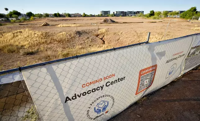 The lot of the future victims' advocacy center is shown, Wednesday, Sept. 4, 2024 in Gilbert, Ariz. The town has obligated only one-quarter of funds received through the American Rescue Plan for projects, according to the most recent data from the federal government. Construction on the dirt lot near its fire department for the advocacy center remain unrealized. (AP Photo/Matt York)