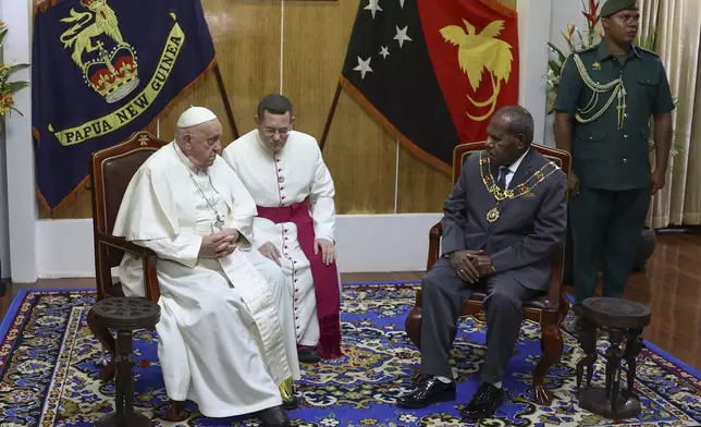 Pope Francis meets with the Papua New Guinea's Governor General Sir Bob Dadae at Government House in Port Moresby, Papua New Guinea, Saturday, Sept. 7, 2024. (Guglielmo Mangiapane/Pool Photo via AP)