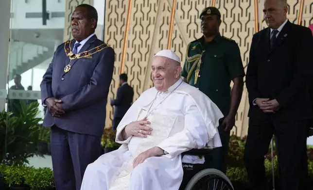 Pope Francis welcomed by Papua New Guinea Governor general Sir Bob Bofeng Dadae at APEC Haus in Port Moresby, Papua New Guinea, Saturday, Sept. 7, 2024. (AP Photo/Mark Baker)