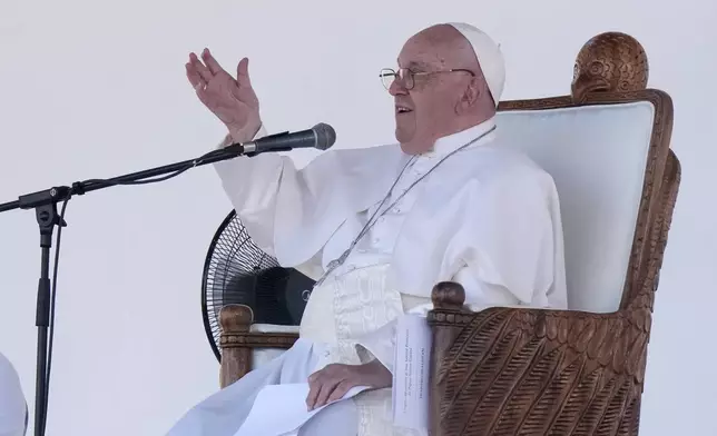 Pope Francis gives an address during meeting with young people in the Sir John Guise Stadium in Port Moresby, Papua New Guinea, Monday, Sept. 9, 2024. (AP Photo/Mark Baker)