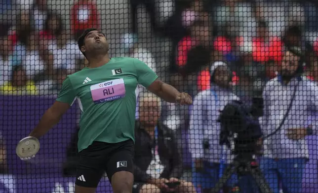 Pakistan's Ali Haider competes in the Men's Discus Throw - F37 during the 2024 Paralympics, Friday, Sept. 6, 2024, in Paris, France. (AP Photo/Thibault Camus)