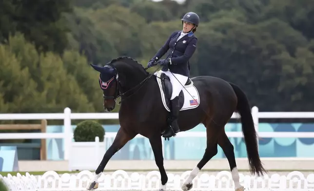 Rebecca Hart of the U.S. competes at the Individual Freestyle Event - Grade III at Château de Versailles at the 2024 Paralympics, Saturday, Sept. 7, 2024. (AP Photo/Kileigh Kane)