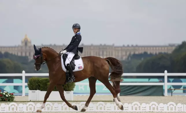 Fiona Howard of the U.S. competes in the individual Freestyle Event - Grade II at the Château de Versailles at the 2024 Paralympics, Saturday, Sept. 7, 2024. (AP Photo/Kileigh Kane)