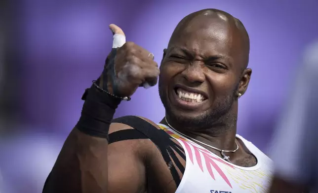 Mauricio Valencia, of Colombia, reacts after getting the second position at Men's Javelin Throw F34 Final at the Stade de France stadium, during the 2024 Paralympics, Wednesday, Sept. 4, 2024, in Paris, France. (AP Photo/Emilio Morenatti)