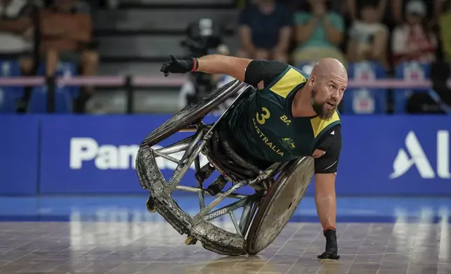 Australia's Ryley Batt competes during the wheelchair rugby bronze medal match between Australia and Great Britain at the 2024 Paralympics, Monday, Sept. 2, 2024, in Paris, France. (AP Photo/Aurelien Morissard)