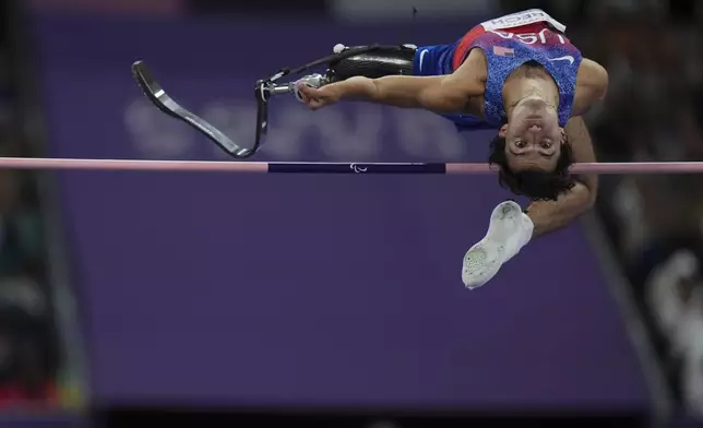 Ezra Frech from the U.S competes during the men's High Jump T63 final during the 2024 Paralympics, Tuesday, Sept. 3, 2024, in Paris, France. (AP Photo/Thibault Camus)