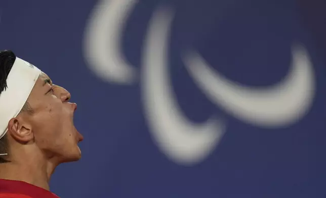 Japan's Tokito Oda celebrates during the men's singles gold medal match of wheelchair tennis at the 2024 Paralympics, Saturday, Sept. 7, 2024, in Paris, France. (AP Photo/Thibault Camus)