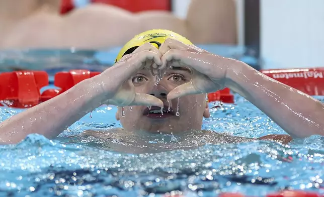 Australia's Callum Simpson celebrates winning the men's 100 freestyle S8, at the Paris La Défense Arena, during the 2024 Paris Paralympics, Friday, Sept. 6, 2024, in Paris, France. (AP Photo/Jackson Ranger)