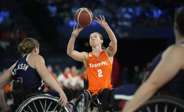 Netherlands' Ilse Arts in action during the gold medal match of the women's wheelchair basketball between Netherlands and United States, at the 2024 Paralympics, Sunday, Sept. 8, 2024, in Paris, France. (AP Photo/Christophe Ena)