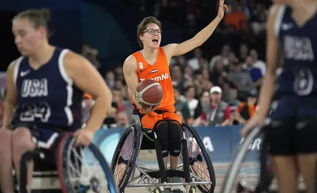 Netherlands' Bo Kramer in action during the gold medal match of the women's wheelchair basketball between Netherlands and United States, at the 2024 Paralympics, Sunday, Sept. 8, 2024, in Paris, France. (AP Photo/Christophe Ena)